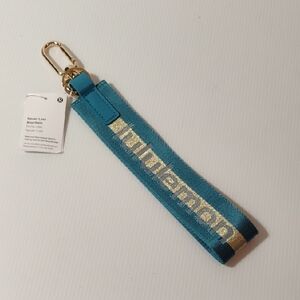 Lululemon Never Lost Keychain In Blue/Gold New With Tags